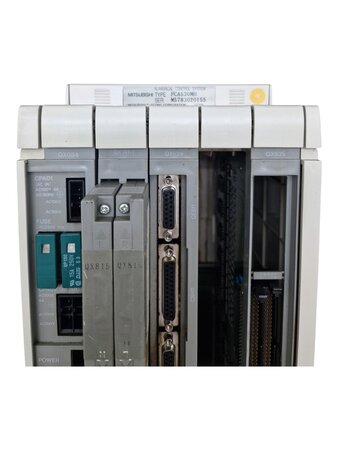 Additional image Mitsubishi FCA530MH control unit with nameplate and visible QX084 QX141-1 QX524 and QX535 modules